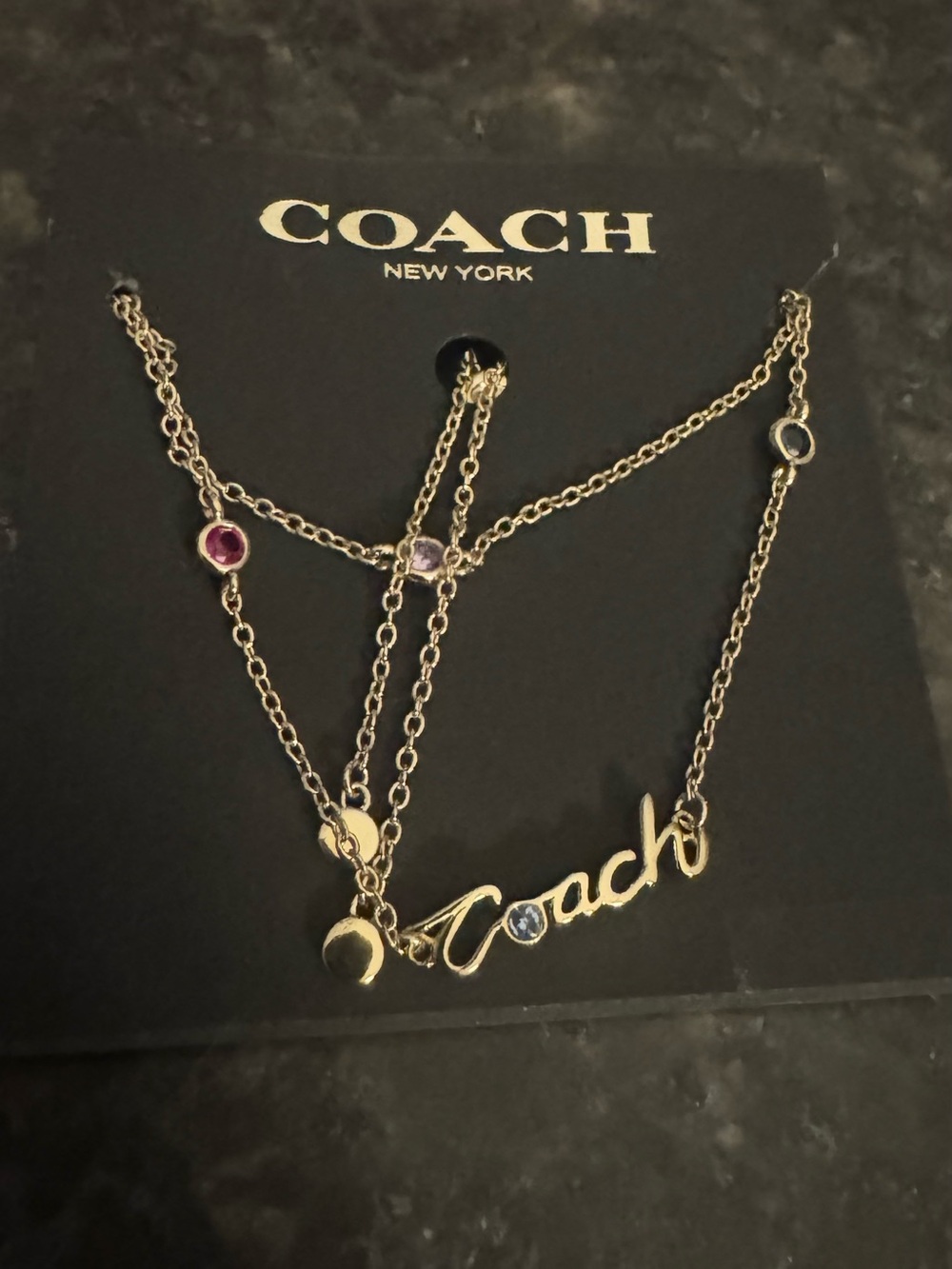 COACH Gold-Tone Script Logo Adjustable/Slider Bracelet.  Colored Stones - Women